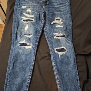 American Eagle Outfitters Next Level Stretch Ripped Blue Skinny Jeans